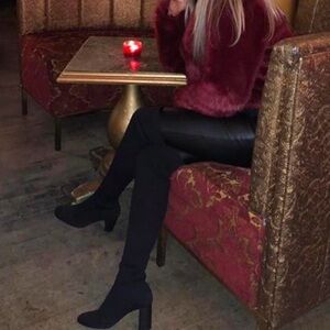 Zara knee high knit boots.